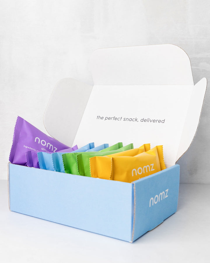 nomz: treat your body · organic snacks, superfoods, nut butters + more